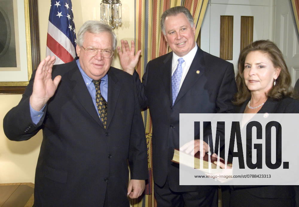 Hastert Sires Speaker of the House Dennis Hastert , R-Ill., left, participates in a mock swearing-in ceremony with incoming Rep.-elect Albio Sires, D-N.J., center, and his wife Adrienne Sires, Monday, Nov. 13, 2006, in Washington. Sires is filling the House seat of Bob Menendez for the balance of the Congressional term. Washington DC USA