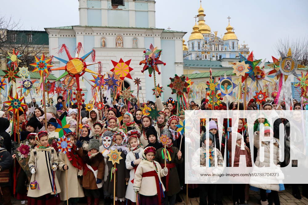 Ukrainians Celebrate Christmas People in traditional costumes with Christmas Stars during Christmas procession on December 25, 2024 in Kyiv, Ukraine.
