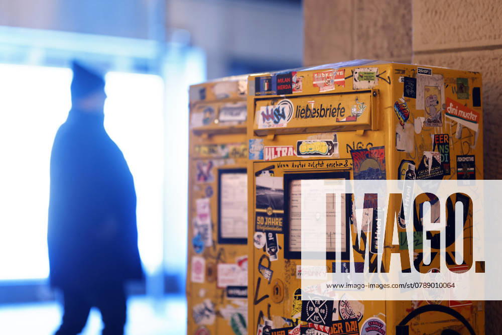 Two letterboxes in front of a kiosk in Cologne city center are covered in stickers Letter postage is set to rise at the beginning of 2025 Post is also set to become slower Symbol image, theme image Cologne, 26 12 2024 NRW Germany
