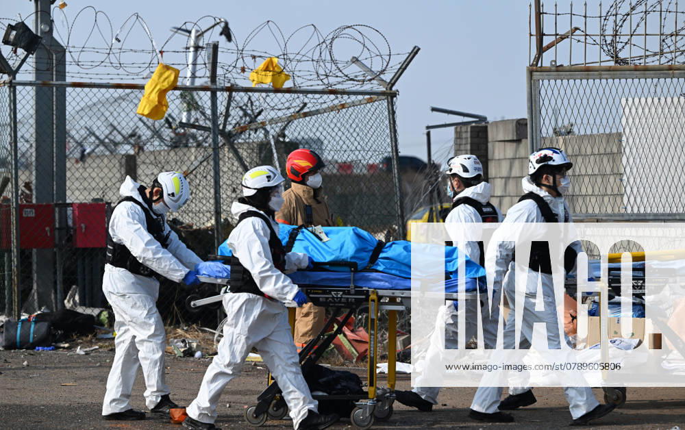 (241229) -- SEOUL, Dec. 29, 2024 -- Rescuers operate at the site of an airplane crash at the Muan International Airport, some 290 km southwest of Seoul, South Korea, Dec. 29, 2024. Most of the people aboard a South Korean airplane that crashed at an airport in southwest South Korea on Sunday morning were believed to have been killed except two rescued, local fire authorities said. The passenger plane with 175 passengers, including 173 South Koreans and two Thais, as well as six flight attendants on board, crashed while attempting to land at the Muan International Airport, some 290 km southwest of the capital Seoul, at about 9:07 a.m. local time (0007 GMT). ( via Xinhua) (SpotNews)SOUTH KOREA-MUAN-AIRPLANE CRASH-AFTERMATH NEWSIS