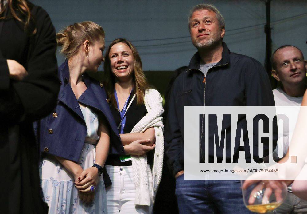 Actress Yulia Peresild, Polina Deripaska, chairperson of the Board of Directors at Forward Media Group Publishing House, and Russian businessman Roman Abramovich (L-R) attend the Zorkiy & the Ladies concert at the 28th Kinotavr Film Festival. Vyacheslav Prokofyev TASS TS052B1B