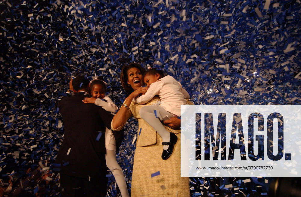 Michelle Obama U.S. Senator-elect Barack Obama, with daughter Malia, wife Michelle and daughter Sasha, wave to supporters at his victory celebration Nov. 2, 2004 at the at the Hyatt Regency Hotel in Chicago. (Jason Wambsgans Chicago Tribune TNS) Chicago IL USA