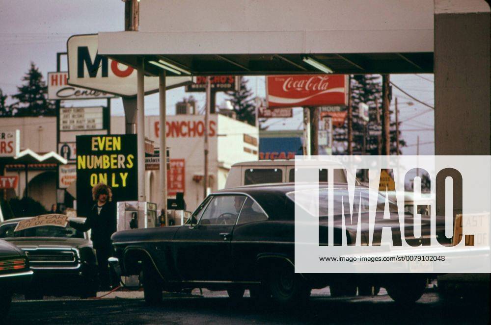 The State of Oregon Was the First to Go to a System of Odd and Even Numbers During the Gasoline Crisis in the Fall and Winter of 1973-74. Here Motorists with Even Numbered Licenses Line Up for Gasoline on an Even Numbered Day. The Plan Was in Effect Monday through Friday. Anyone Could Get Gas on Saturdays If It Was Available. All Stations Were Closed Sundays. Portland OR, February 1974 Hollywood CA USA