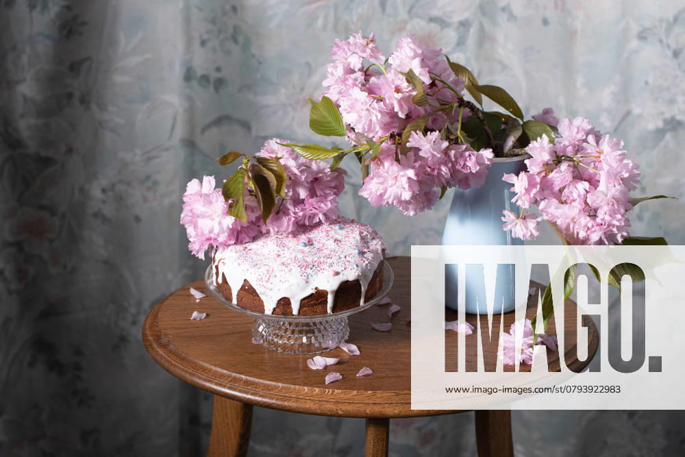 Easter cake and painted eggs and a bouquet of pink sakura flowers on a table in a decorated spring room, a beautiful still life. High quality photo , 47387408.jpg, provence, baking, bloom, blurry, branches, color, floral, flower, painted, petals, pink, preparation, season, still life, symbol, vintage, wooden, background, cake, celebration, dessert, holiday, homemade, traditional, white, bakery, closeup, easter, eggs, happy, kulich, orthodox, religion, spring, celebrate, decoration, delicious, easter cake, food, nobody, sweet, baked, bakery products, bread, catholic copy space, christianity, easter egg, egg, family, festive RECORD DATE NOT STATED