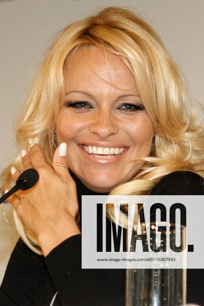 Pamela Anderson at the Press conference to the Broadcast Welcome at Carmen Fog at BMW Car dealership on Kurfuerstendamm in Berlin