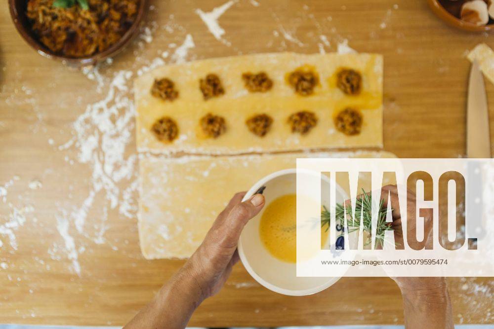 Woman preparing fresh ravioli, partial view model released Symbolfoto property released JRFF01403