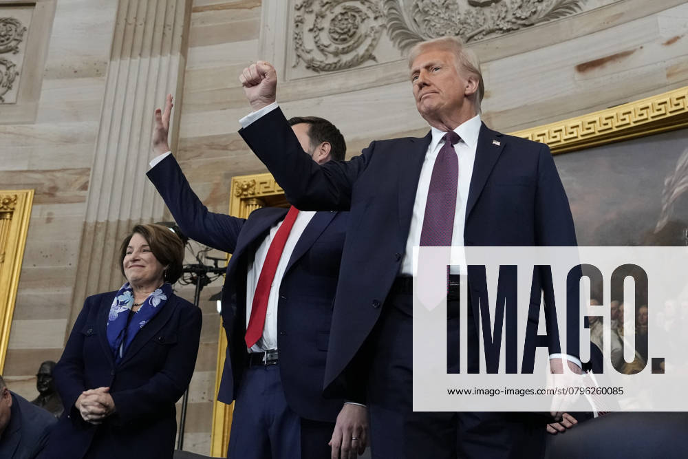 President Donald Trump gestures as he is joined on stage by Vice President JD Vance after being sworn in as the 47th president of the United States during the 60th Presidential Inauguration in the Rotunda of the U.S. Capitol in Washington, Monday, January 20, 2025. Pool photo by Morry Gash WAX20250120848 MorryxGash