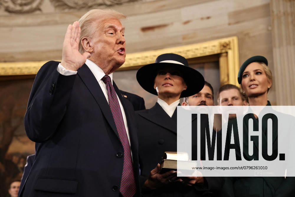 Trump and Vance Swearing-In at the US Capitol - DC President-elect Donald Trump takes the oath of office as Melania Trump, Ivanka Trump, Donald Trump Jr. and Eric Trump look on during inauguration ceremonies in the Rotunda of the U.S. Capitol on January 20, 2025 in Washington, DC. Donald Trump takes office for his second term as the 47th president of the United States. Photo by Chip Somodevilla Pool CNP ABACAPRESS.COM Washington DC United States