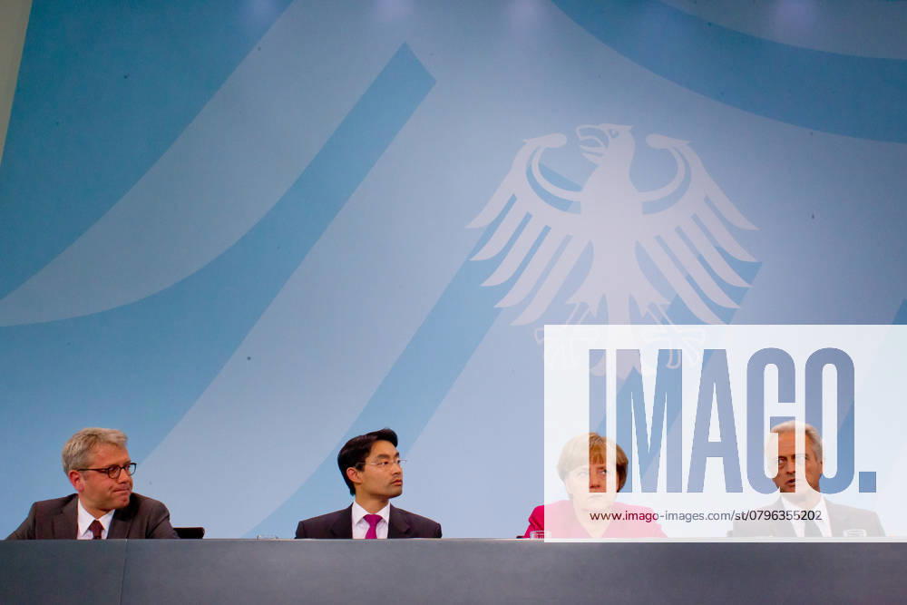 Norbert Roettgen, Philipp Roesler, Angela Merkel, Peter Ramsauer at the Press conference to Nuclear phase-out to the Report the Ethics Committee secure Energy supply at Federal Chancellery in Berlin, Copyright Huebner, 30 05 2011 Berlin Germany , Germany