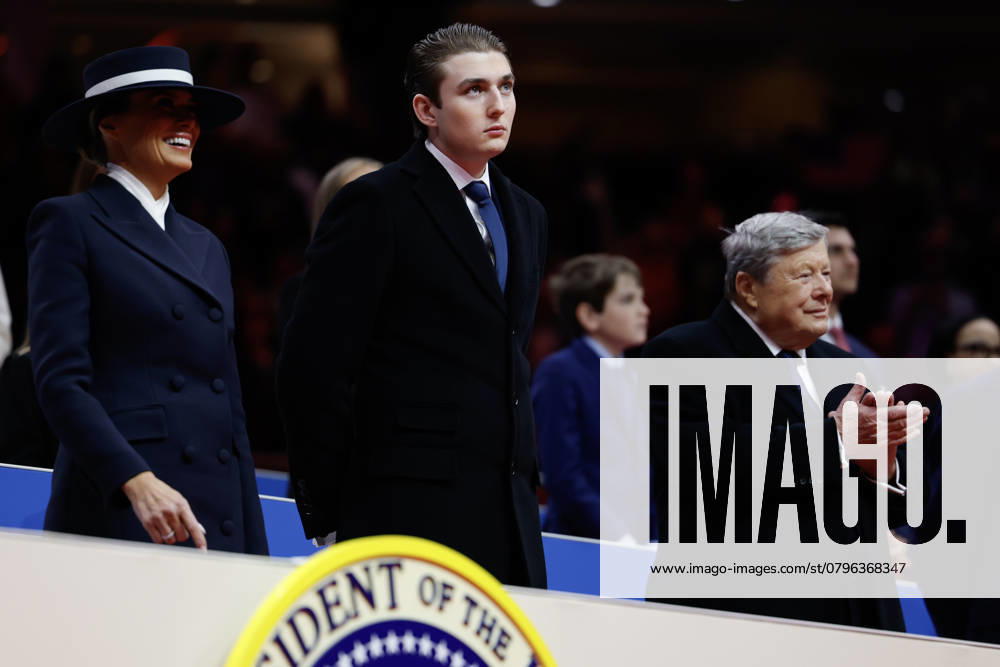 The Inauguration Of Donald J. Trump As The 47th President WASHINGTON, DC - JANUARY 20: First lady Melania Trump, Baron Trump, and Viktor Knavs watch during an indoor inauguration parade at the Capital One Arena on January 20, 2025 in Washington, DC. Donald Trump takes office for his second term as the 47th president of the United States. Credit: Anna Moneymaker Pool via CNP AdMedia Washington District of Columbia United States of America