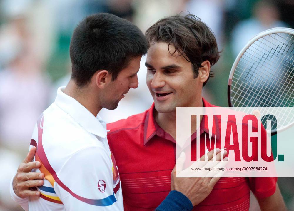 -- Roger Federer (R) of Switzerland and Novak Djokovic of Serbia greet each other after the men s singles semifinal match at the French Open tennis tournament at the Roland Garros stadium in Paris, capital of France, June 3, 2011. Federer won the match 3-1. (Xinhua Bai Xue) FRANCE-PARIS-TENNIS-FRENCH OPEN-SEMIFINAL