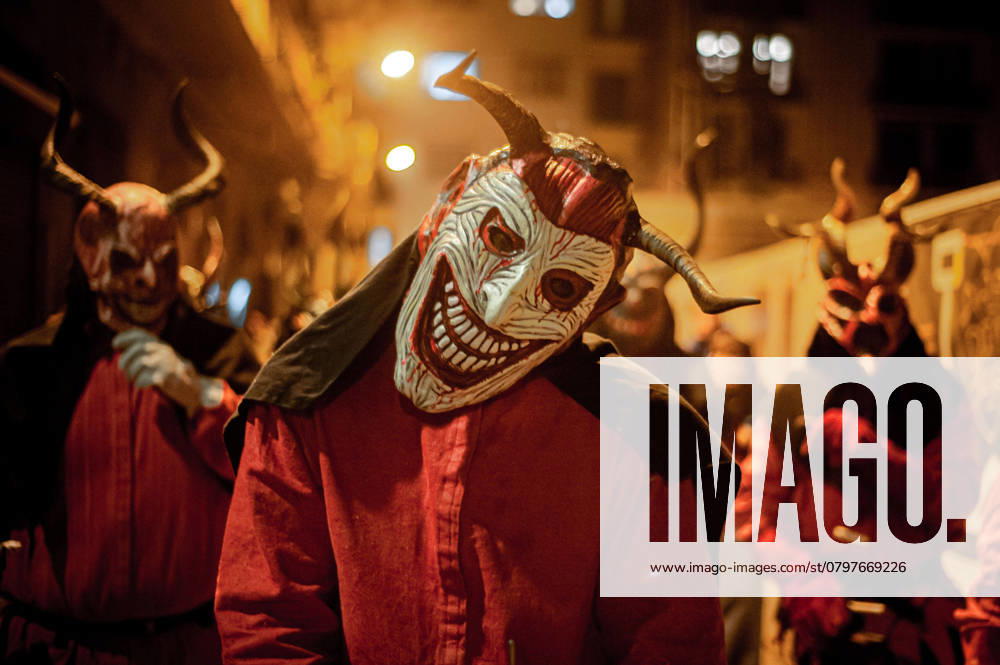 Traditional catalan devils wearing diabolic masks are seen during the festival of Els Foguerons in the Garcia quarter of Barcelona. The Festival of Els Foguerons de sa Pobla is a Mallorcan celebration held in the Gracia district of Barcelona since 1993 featuring Catalan folklore with traditional characters like devils and correfocs Barcelona Spain - ZUMAb137 20250125_fap_b137_005