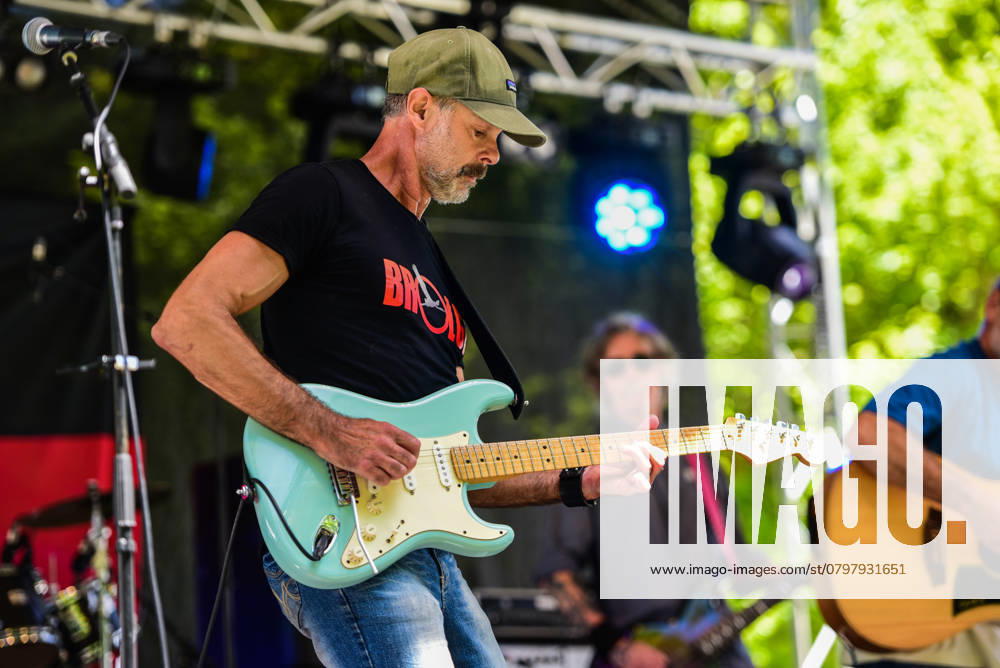 Guitarist Lee Morgan is seen performing with Jarrah band at Share the Spirit - Keep the Fire Burning festival at Treasury Gardens in Melbourne. Share the Spirit - Keep the Fire Burning festival was organized by Songlines Aboriginal Music Corporation as a part of Invasion Day events ?on January 26, celebrating Indigenous culture on a day that is observed as one of mourning for many First Nations people..Jarrah Band s is fronted by singer songwriter and proud Indigenous (Butjulla and Gubbi Gubbi) man Gavin Somers and his band Jarrah perform music which encompasses an edgy blend of contemporary folk rock, with strong acoustic rhythms and vocal harmonies. Melbourne Australia - ZUMAs197 20250126_aaa_s197_506