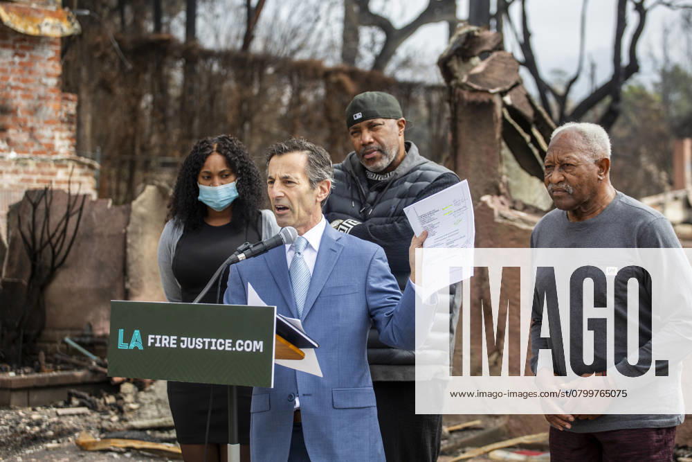 Lawyer Doug Boxer, 2nd L, speaks in a press conference held by LA Fire Justice to discuss its lawsuit against Southern California Edison on behalf of Walter Butler, R, a local shoe store operator who lost his home in the Eaton Fire. The event took place outside Butler s destroyed home in Altadena, California, on Feb. 4, 2025. Los Angeles USA - ZUMAc68_ 20250204_zaf_c68_005