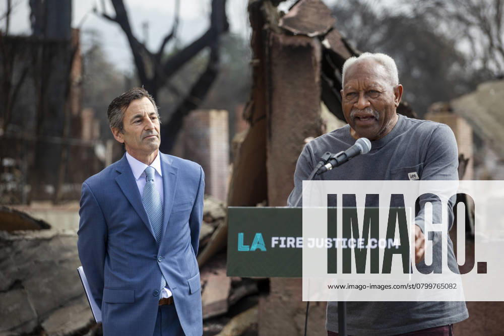 Lawyer Doug Boxer, L, listens as Walter Butler, a local shoe store operator who lost his home in the Eaton Fire, speaks in a press conference held by LA Fire Justice to discuss its lawsuit against Southern California Edison. The event took place outside Butler s destroyed home in Altadena, California, on Feb. 4, 2025. Los Angeles USA - ZUMAc68_ 20250204_zaf_c68_008
