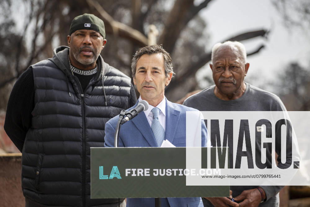 Lawyer Doug Boxer, C, speaks in a press conference held by LA Fire Justice to discuss its lawsuit against Southern California Edison on behalf of Walter Butler, L, a local shoe store operator who lost his home in the Eaton Fire. The event took place outside Butler s destroyed home in Altadena, California, on Feb. 4, 2025. Los Angeles USA - ZUMAc68_ 20250204_zaf_c68_013