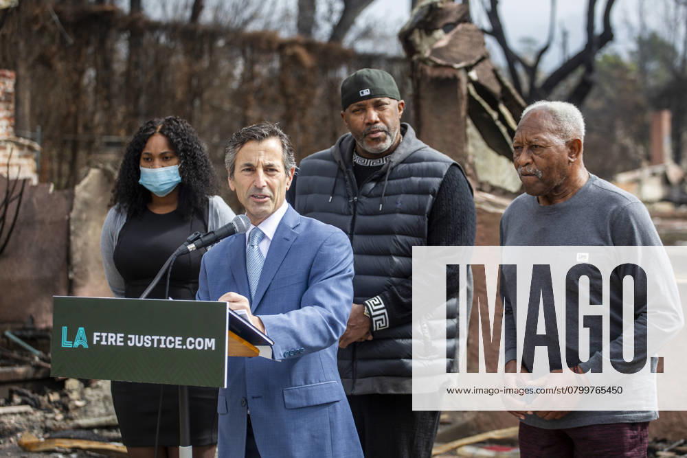 Lawyer Doug Boxer, 2nd L, speaks in a press conference held by LA Fire Justice to discuss its lawsuit against Southern California Edison on behalf of Walter Butler, R, a local shoe store operator who lost his home in the Eaton Fire. The event took place outside Butler s destroyed home in Altadena, California, on Feb. 4, 2025. Los Angeles USA - ZUMAc68_ 20250204_zaf_c68_015