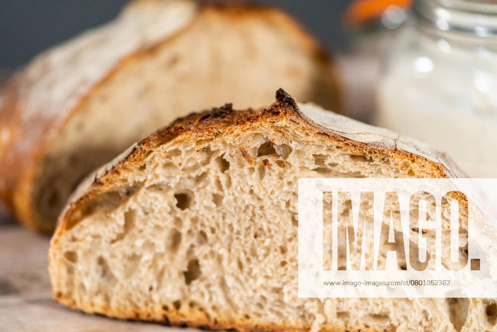Sliced baked sourdough rye loaf of bread. , 50429740.jpg, Active culture, Bread, Container, Food, Glass container, Healthy eating, Homemade, Jar, Mason jars, Sourdough, Sourdough bread, Sourdough starter, active, artisan, bread starter, bubble, classic, dough, fermentation, glass, handmade, healthy, home made, leaven, loaf, rising, rustic, slice, sliced, starter, wild yeast, yeast RECORD DATE NOT STATED