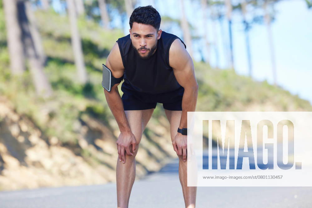 Fitness, exercise and tired with a sports man taking a break from his workout, training or running on a road in nature. Health, wellness and breathing with a young male athlete resting during his run., model released, , 50661526.jpg, fitness, exercise, tired, sports, man, young, male, running, nature, health, sport, fit, training, workout, road, wellness, run, break, athlete, resting, breath, breathing, exhausted, people, natural, alone, one, men, looking, summer, 20s, attractive, outside, person, real, outdoors, outdoor, street, handsome, forest, healthy, lifestyle, day, green, guy, tree, thinking, muscular, active, trees RECORD DATE NOT STATED