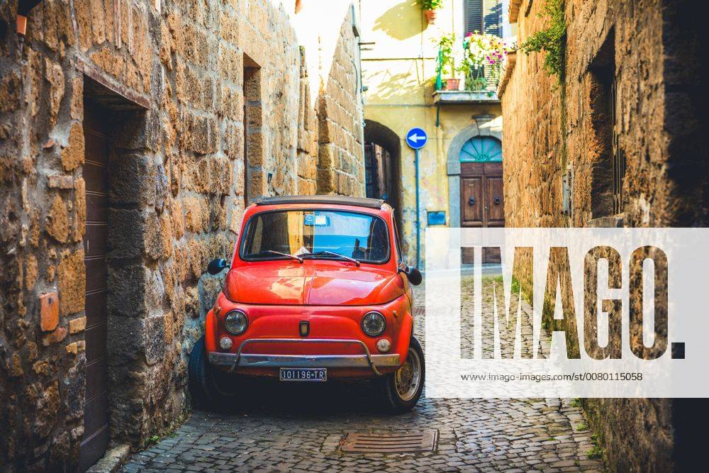 Age Red Fiat 500 park in a narrow Sac Oldtimer Orvieto Umbria Italy Europe