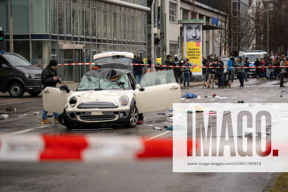 A car crashes into a crowd of people at a Verdi demonstration in downtown Munich. The damaged car