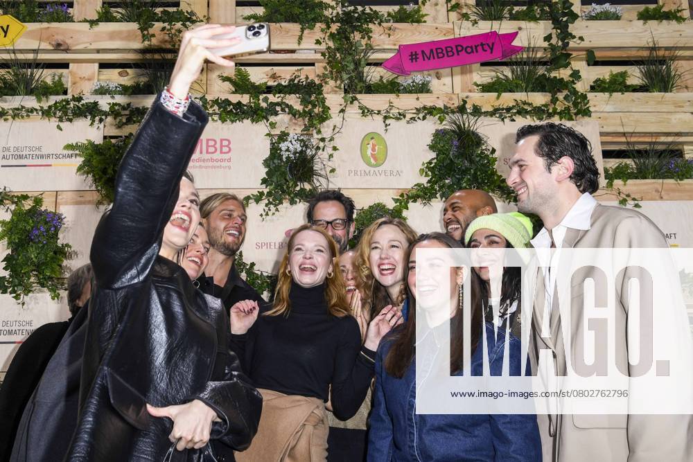 Emilia Schüle, Rurik Gislason, Karoline Herfurth, Dilara Aylin Ziem, Malick Bauer, Ilknur Boyraz and Samuel Schneider actress take cell phone photos as guests at the Medienboard Party at Holzmarkt in Berlin at the 75th Berlin International Film Festival on 15 02 2025 in Berlin Berlin Germany