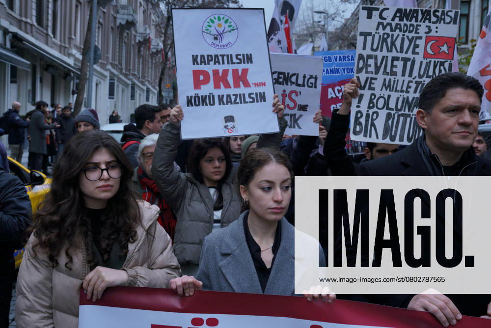 A protester, hold banner reading People s Equality and Democracy Party (DEM) Party should be closed down, Kurdish Workers Party (PKK) should be rooted out. during a protest demonstration against Turkey s new Kurdish initiative process at Besiktas in Istanbul on February 16, 2025. Turkey s new Kurdish initiative process started with the call of Nationalist Movement Party (MHP) Chairman Devlet Bahceli to Kurdish Workers Party jailed leader (PKK) Abdullah Ocalan to disband the organization on 22Ã‚ OctoberÃ‚ 2024. Besiktas Turkey - ZUMAu194 20250216_zip_u194_005