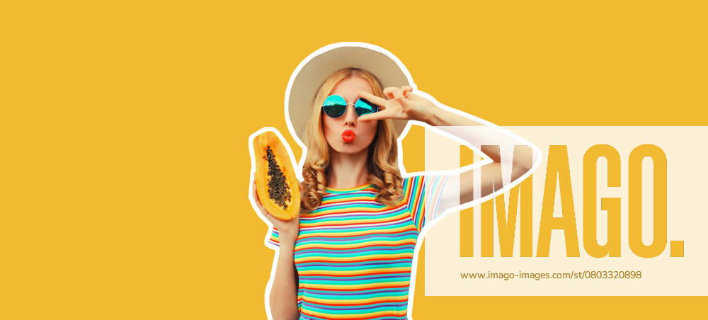 Sommer Porträt der stilvollen jungen Frau mit frischen saftigen Papaya bläst ihre Lippen senden Luft Kuss tragen Strohhut, Sonnenbrille posiert auf gelbem Hintergrund, Magazin-Stil Summer portrait of stylish young woman with fresh juicy papaya blowing her lips sending air kiss wearing straw hat, sunglasses posing on yellow background, magazine style ,model released, Symbolfoto