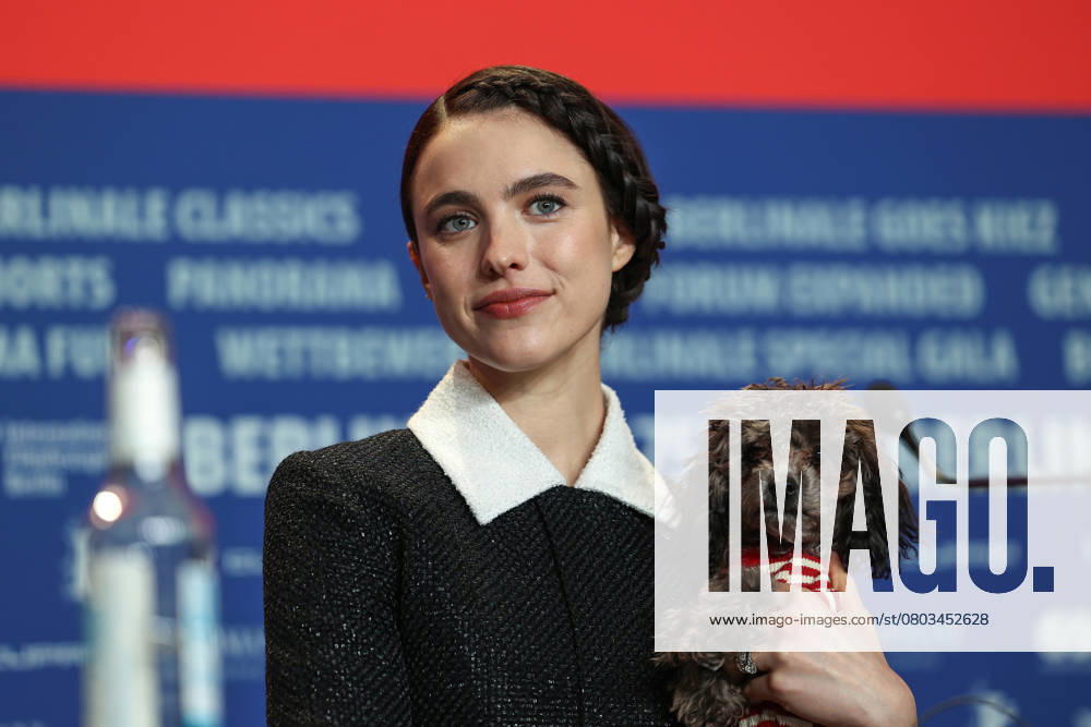 Actress MARGARET QUALLEY holds her dog as she answers journalists questions during a press conferenceThe 75th Berlinale Film Festival. Berlin Germany - ZUMAt227 20250218_zip_t227_001