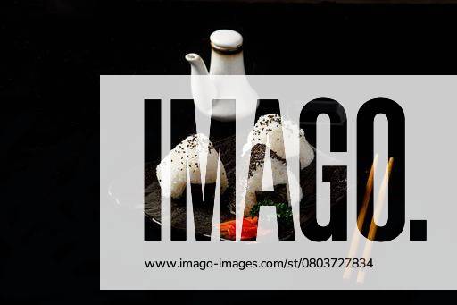 IMAGO Creative, Food, Japan, Onigiri onigiri three balls or triangles of rice on black background japanese food 25737717 RECORD DATE NOT STATED