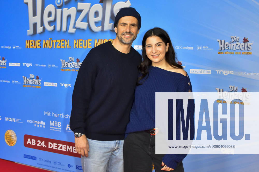 Tom Beck with Chryssanthi Kavazi Actors to Guest at the Red Carpet at the Cinema Film Premiere the Heinzels New Muetzen New Mission at Cinedome on 08 December 2024 in Cologne NRW Germany