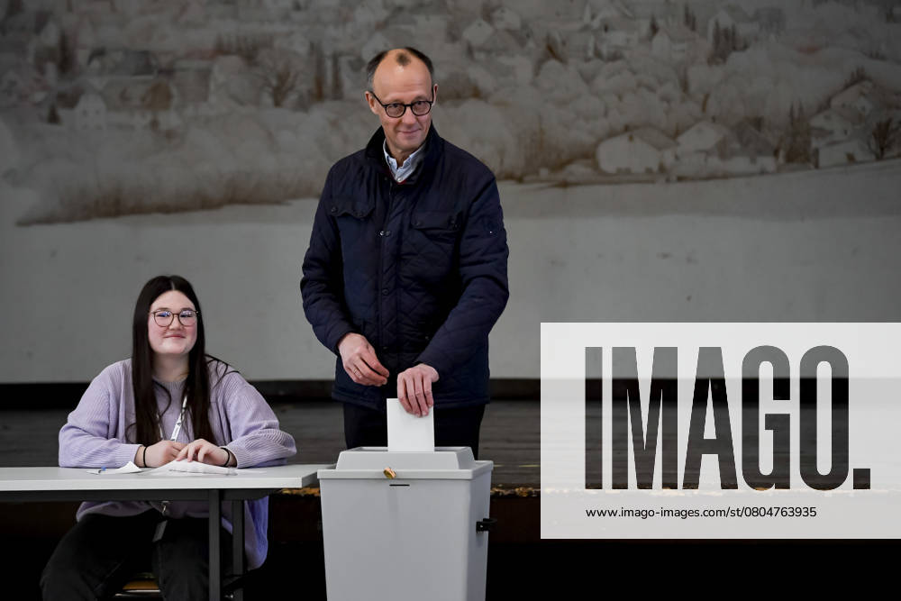 Friedrich Merz at the ballot box during the Voting at the polling station for the Bundestag elections on February 23, 2025 in Arnsberg, Germany Photo by Max Maiwald DeFodi Images Friedrich Merz at the ballot box during the Voting at the polling station for the Bundestag elections on February 23, 2025 in Arnsberg, Germany Photo by Max Maiwald DeFodi Images