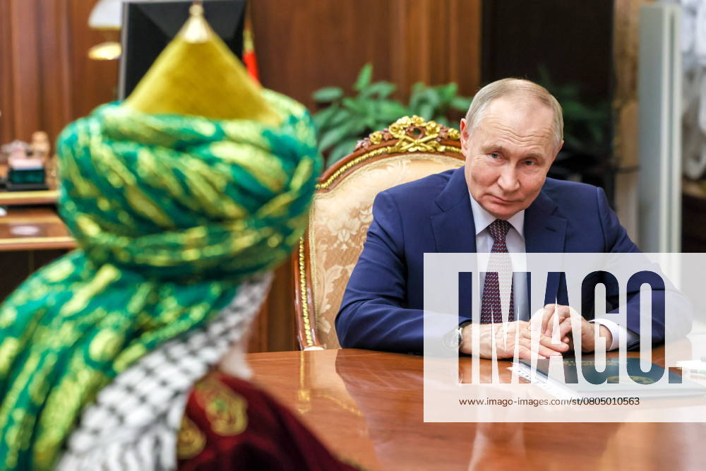 RUSSIA, MOSCOW - FEBRUARY 24, 2025: Russia s President Vladimir Putin (R) and Talgat Tajuddin, Grand Mufti of Russia, Chairman of the Russian Central Religious Board of Muslims, hold a meeting at the Moscow Kremlin. Mikhail Metzel Russian Presidential Press and Information Office TASS 78611876