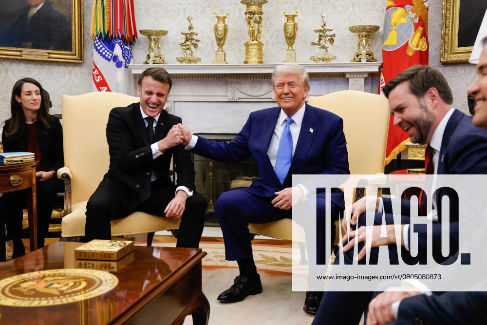 US President Donald Trump and French President Emmanuel Macron shake hands in the Oval Office of the White House in Washington, DC, on Monday, February 24, 2025. Pool WAX20250224202 LUDOVICxMARIN