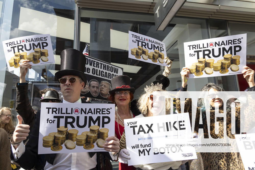 Protesters dressed in mock formal wear hold signs that read TRILLIANIAIRES FOR TRUMP with an image of gold coins your TAX HIKE will fund MY BOTOX outside the Tesla store. A group of demonstrators with the activist group Rise & Resist blockade the entrance to the Tesla showroom in a non-violent act of civil disobedience and are arrested by NYPD. Outside hundreds of protesters fill the street in ManhattanÃ¢â‚¬â ¢s Meatpacking District. The Pull the Plug on Elon protest calls for a Tesla boycott, the prosecution of Musk and his team for data breaches, and for the courts to end Musk and DOGE s access to classified information. New York USA - ZUMAr174 20250301_znp_r174_030