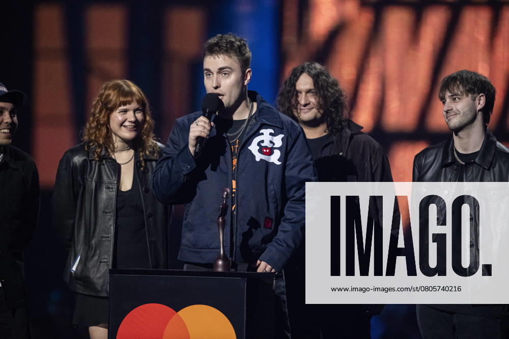 Sam Fender being presented the BRIT Award for Alternative Rock Artist at the 2025 BRIT Awards at The O2 Arena, London on 1 March 2025 Sam Fender being presented the BRIT Award for Alternative Rock Artist at the 2025 BRIT Awards at The O2 Arena, London on 1 March 2025 Sam Fender is an English singer, songwriter, and musician. Fender discovered his passion for music during his teenage years and released several singles independently beginning in ˜17. His sound relies primarily on his traditional American musical upbringing combined with a British rock sensibility. He is known for his high tenor voice and Geordie accent. Recognised for his songwriting style, Fender is the recipient of two Brit Awards., Credit:Dafydd Owen Avalon The O2, Gr