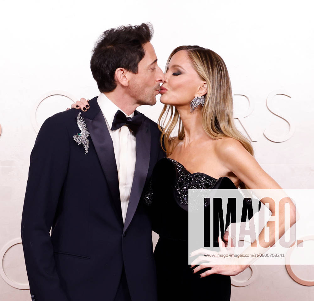 (L-R) Adrien Brody and Georgina Chapman arrive on the red carpet for the 97th Academy Awards in the Hollywood section of Los Angeles on Sunday, March 2, 2025. LAP20250302829 JOHNxANGELILLO