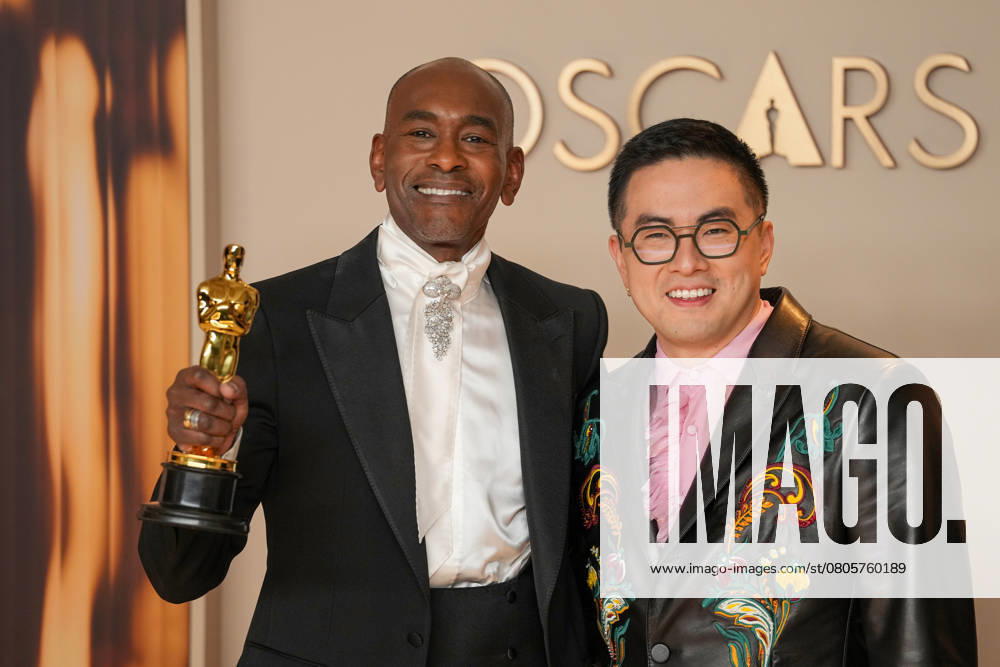Paul Tazewell of Wicked celebrates with Academy Awards presenter Bowen Yang after Tazewell s Oscar for best costume design during the 97th Academy Awards in the Hollywood section of Los Angeles on Sunday, March 2, 2025. LAP20250302118 PATxBENIC