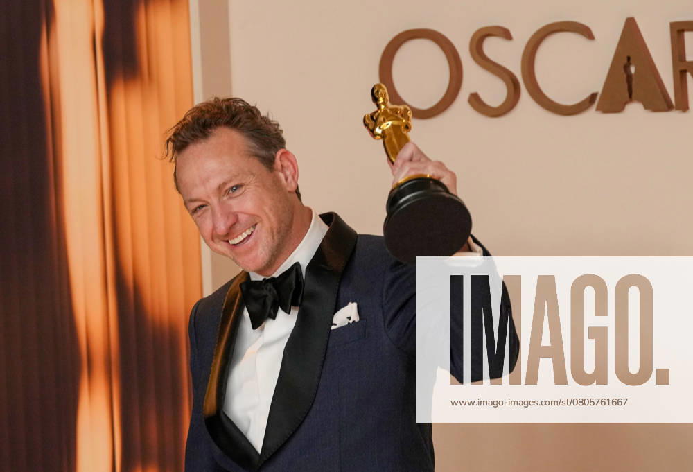 Lol Crawley of The Brutalist celebrates backstage after winning the Oscar for cinematography during the 97th Academy Awards in the Hollywood section of Los Angeles on Sunday, March 2, 2025. LAP20250302145 PATxBENIC