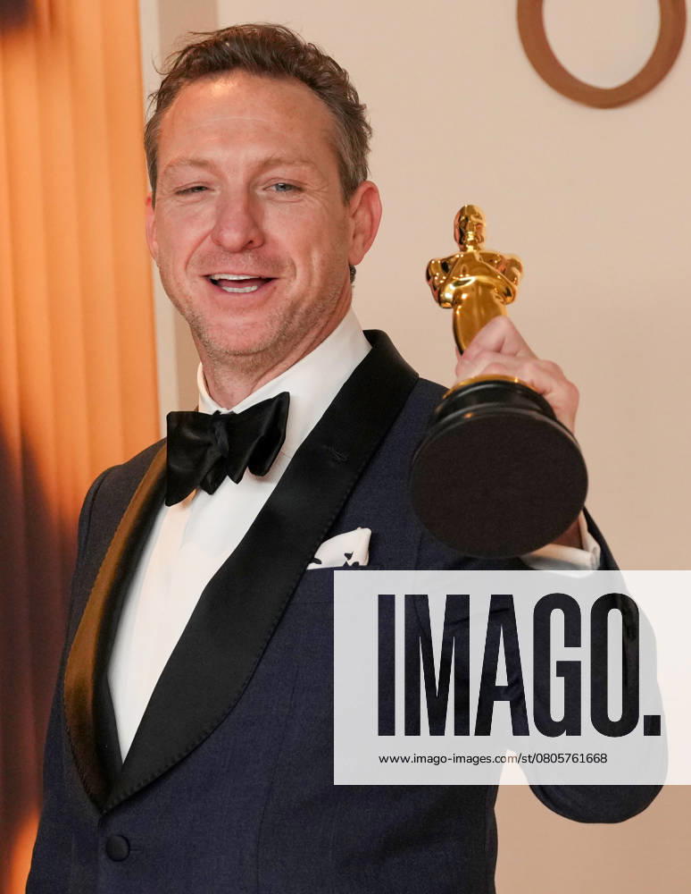 Lol Crawley of The Brutalist celebrates backstage after winning the Oscar for cinematography during the 97th Academy Awards in the Hollywood section of Los Angeles on Sunday, March 2, 2025. LAP20250302146 PATxBENIC