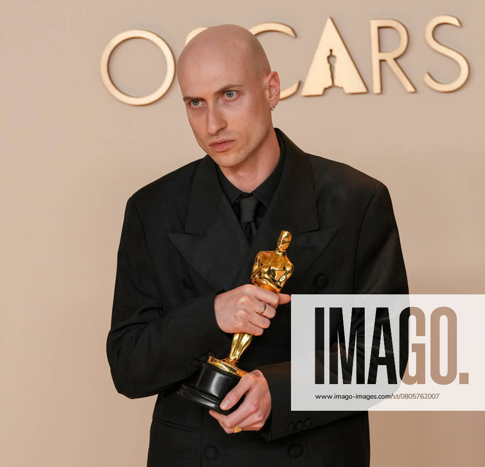 Daniel Blumberg of The Brutalist celebrates backstage after winning the Oscar for original score during the 97th Academy Awards in the Hollywood section of Los Angeles on Sunday, March 2, 2025. LAP20250302151 PATxBENIC