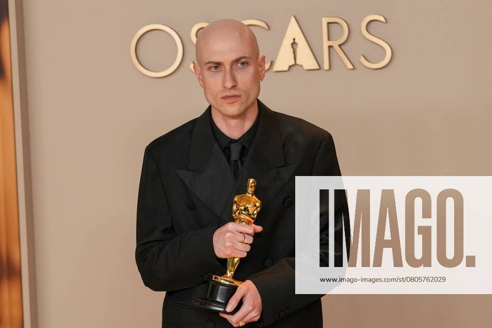 Daniel Blumberg of The Brutalist celebrates backstage after winning the Oscar for original score during the 97th Academy Awards in the Hollywood section of Los Angeles on Sunday, March 2, 2025. LAP20250302152 PATxBENIC