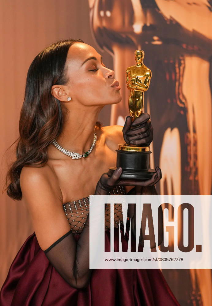 Zoe Saldana of Emilia Pérez celebrates backstage after winning the Oscar for best actress is a supporting role during the 97th Academy Awards in the Hollywood section of Los Angeles on Sunday, March 2, 2025. LAP20250302156 PATxBENIC