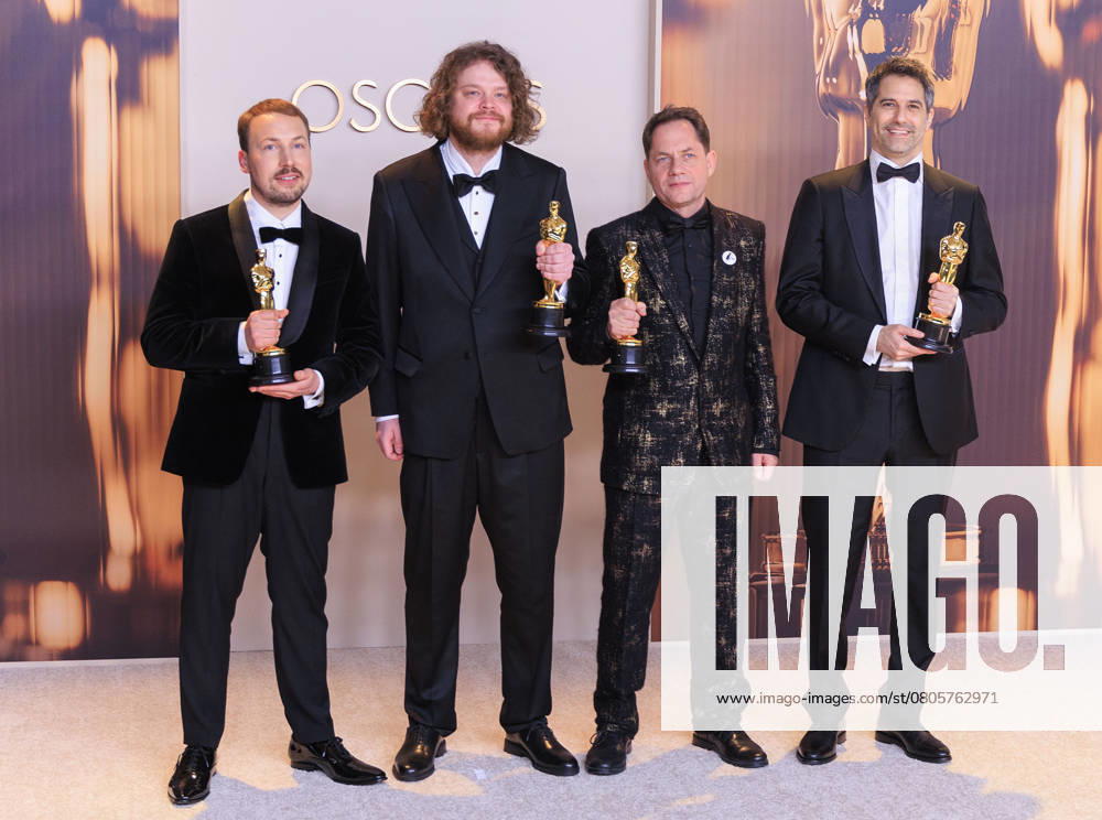 (L-R) Gints Zilbalodis, MatÄ«ss KaA¾a, Ron Dyens, and Gregory Zalcman, winners of the Best Animated Feature Film for â€oeFlowâ€Â, pose in the press room of the 97th Annual Academy Awards on Sunday March 2, 2025 at the Dolby Theater in Hollywood, California. BURT HARRIS BNS PI Hollywood USA - ZUMAp124 20250302_zaa_p124_333