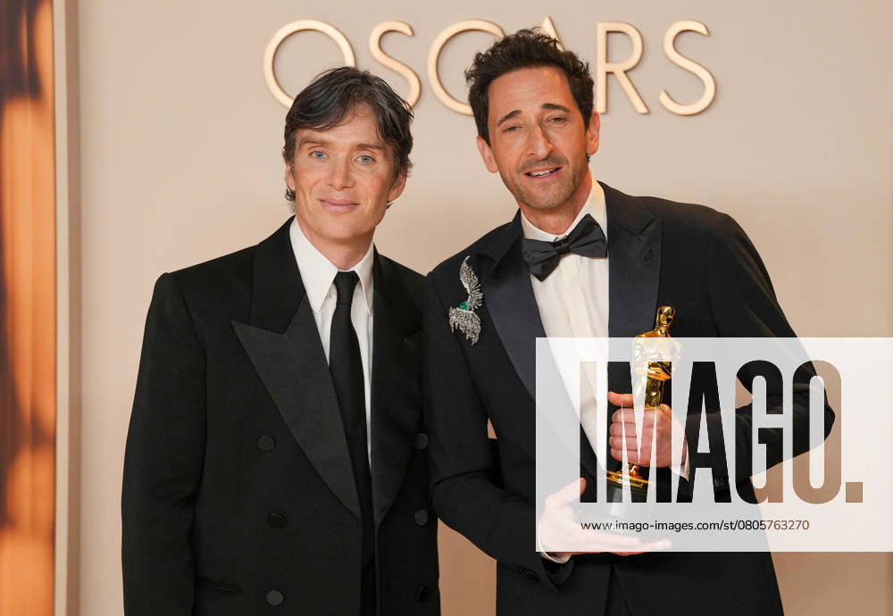 Cillian Murphy (L) joins best performance by an actor in a leading role Oscar winner Adrien Brody of The Brutalist celebrating backstage during the 97th Academy Awards in the Hollywood section of Los Angeles on Sunday, March 2, 2025. LAP20250302169 PATxBENIC