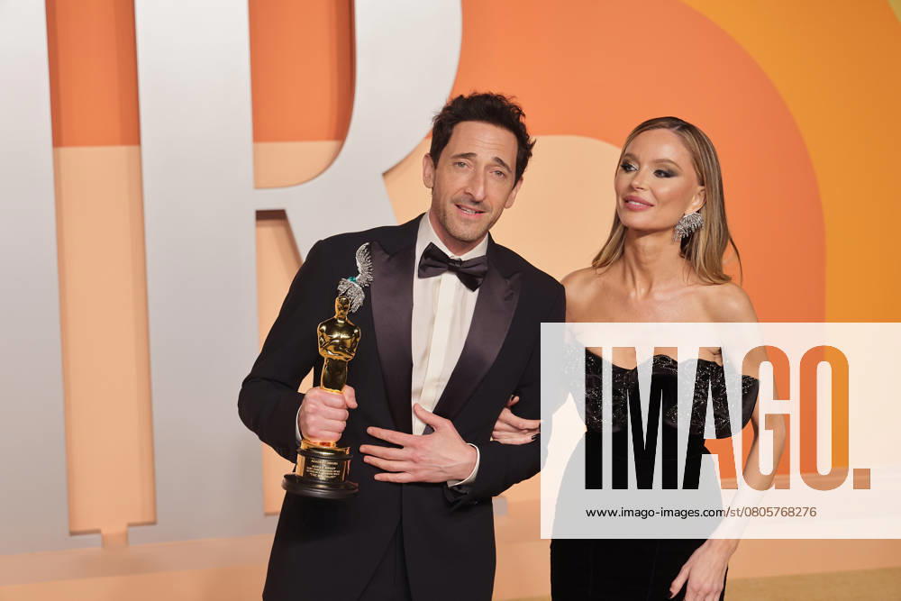 2025 Vanity Fair Oscar Party - Arrivals Adrien Brody and Georgina Chapman attend the 2025 Vanity Fair Oscar Party at Wallis Annenberg Center for the Performing Arts on March 02, 2025 in Beverly Hills, California. Beverly Hills Wallis Annenberg Center for the CA USA