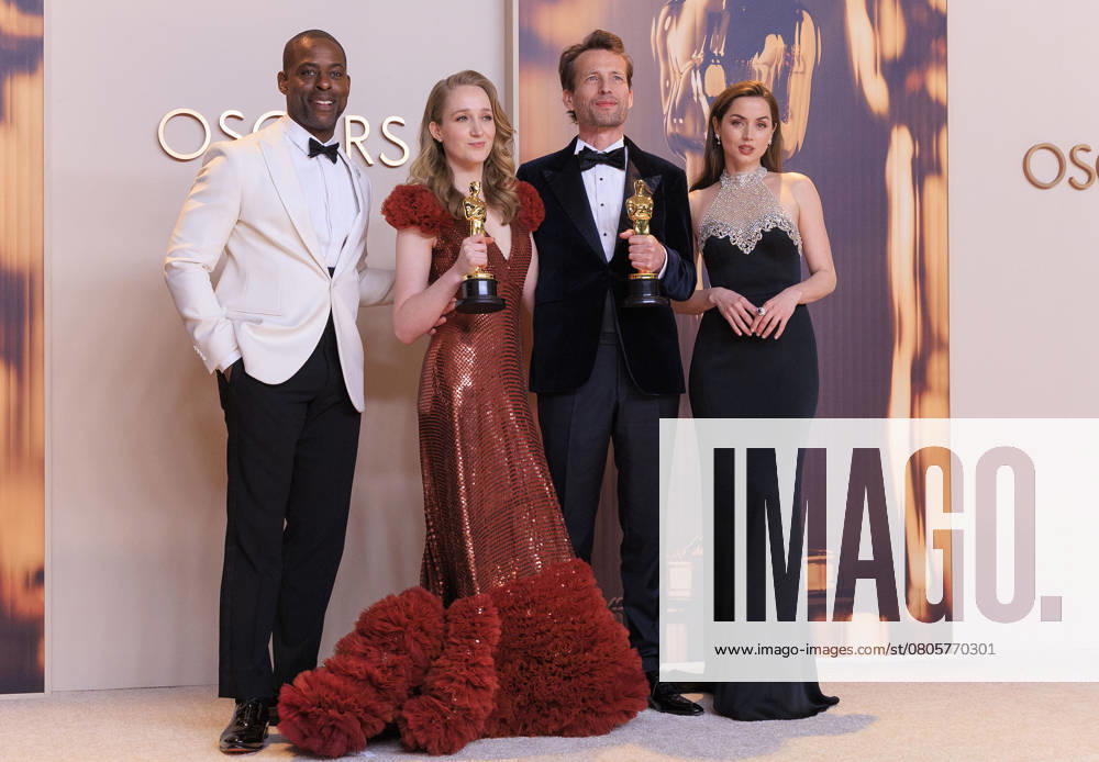 Victoria Warmerdam and Trent (C), winners of the Best Live Action Short Film award for â€oeIâ€⠢m Not a Robotâ€Â, Sterling K. Brown (L) and Ana de Armas (R) pose in the press room of the 97th Annual Academy Awards on Sunday March 2, 2025 at the Dolby Theater in Hollywood, California. BURT HARRIS BNS PI Hollywood USA - ZUMAp124 20250302_zaa_p124_518