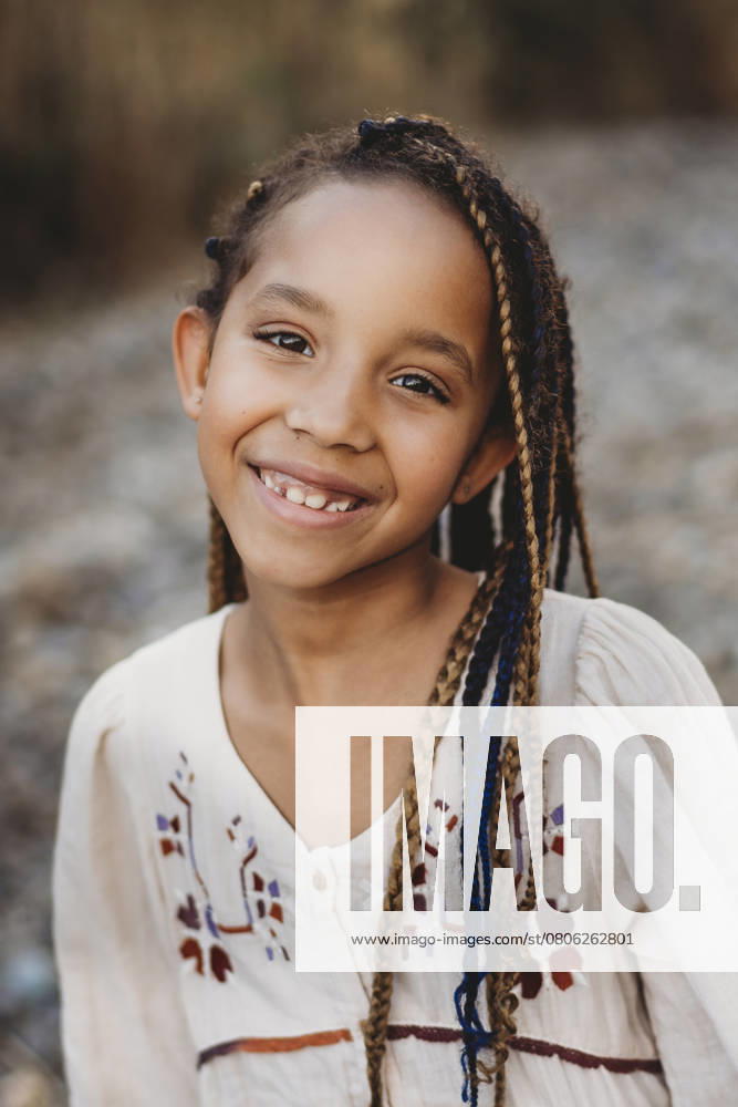 Multiracial black mixed race girl smiling in fields summer Shenandoah, Virginia, United States CR_TANI250303-1668864-01 ,model released, Symbolfoto