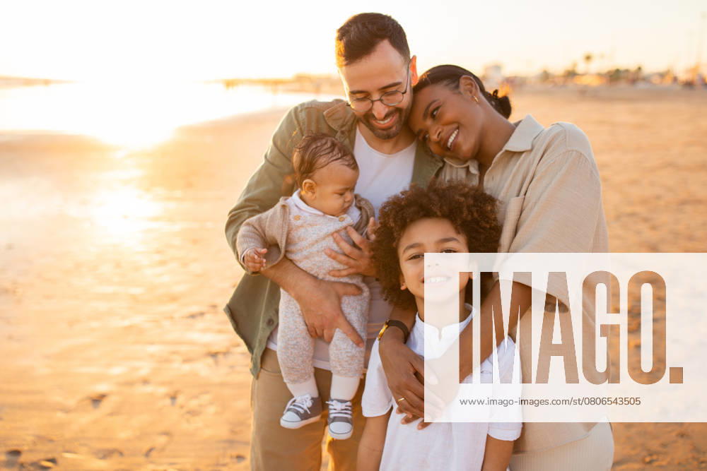 Family love on the beach. Happy family enjoying the weekend on beach in the evening, parents spending time with sons outdoors. Family time together, parenting concept, model released, , 52224932.jpg, lifestyle, holiday, mom, leisure, child, outside, walking, female, parenthood, parent, woman, husband, sunshine, young, dad, weekend, free space, coastline, man, tender, caucasian, fun, bonding, mother, three, seaside, male, multiracial, ocean, beach, smile, together, childhood, copy space, love, outdoors, happy, father, sea, sand, wife, nature, healthy, embrace, kids, summer, family, evening RECORD DATE NOT STATED