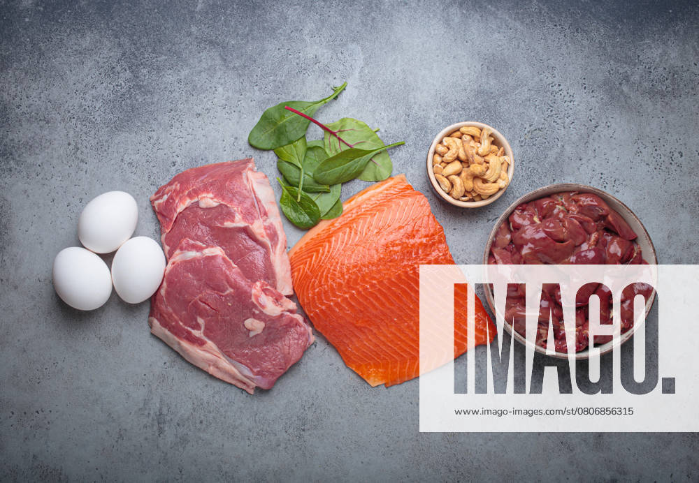 Food ingredients high in iron for health and wellness top view on grey concrete background Food ingredients high in iron for health and wellness top view on grey concrete background